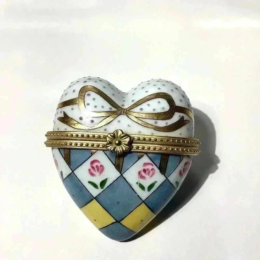 Vintage ceramic jewelry box as a heart, multicolored with flower designs